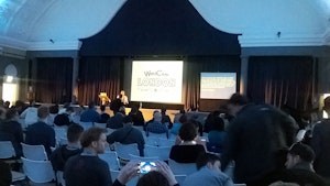 Waiting for the closing remarks in the main room.