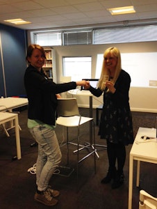Mim graduating from her Girl Geeks coding course.