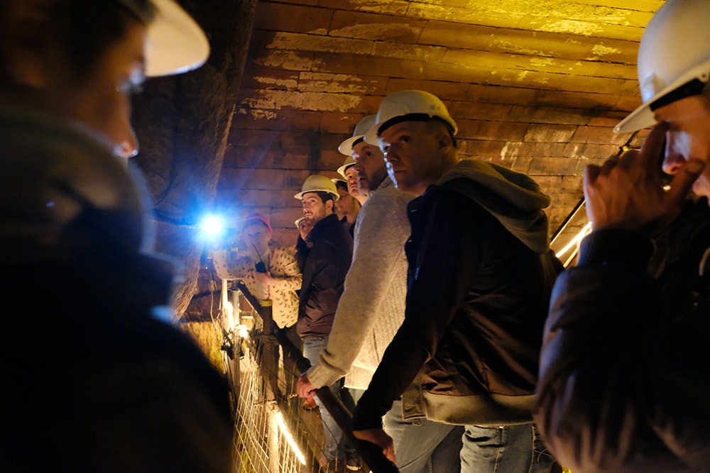 The team on a tour of the Williamson Tunnels