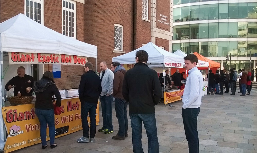 The team visit a local food stall.